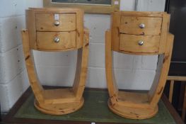 A pair of art deco style two drawer bedside tables.