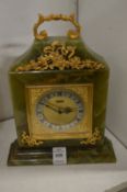 An Elsinor onyx and gilt decorated mantle clock.