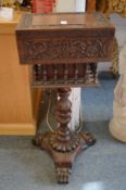 An Anglo Indian carved rosewood work box on stand.