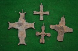 Small bronze crosses.