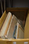 A box of assorted paintings, prints, engravings etc.