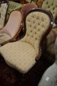 A Victorian button upholstered mahogany framed bedroom chair.