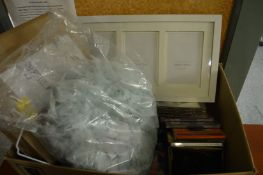 Cd's, picture frame and a feathery lampshade.