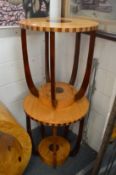 A pair of art deco style circular occasional tables.