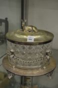 A plated and cut glass biscuit jar on stand.