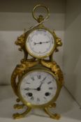 A gilt metal combination clock barometer.