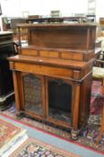A good late Regency rosewood chiffonier, the upper section with brass galleried top, three small