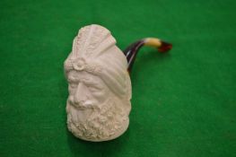 A carved meerschaum pipe depicting an Arab gentleman.