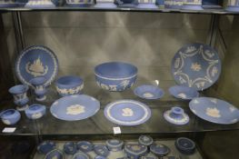 Wedgwood blue jasperware to include decorative plates, fruit bowl etc.