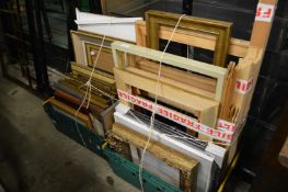 A quantity of picture frames.