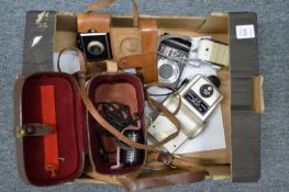 A Kodak camera, a Panasonic Lumix digital camera and other items.