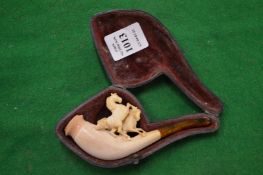A good small meerschaum pipe carved with horses, cased.