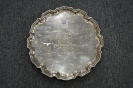 An engraved silver plated salver.