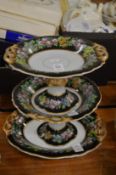 A pair of floral decorated tazza and matching dish.