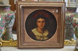 A large Vienna circular portrait dish in a decorative frame.