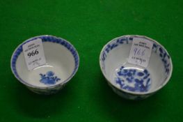 Two Chinese blue and white porcelain tea bowls.