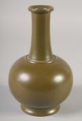 A CHINESE TEA DUST GLAZE BOTTLE VASE, with six-character Qianlong mark, 19cm high.