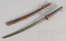 A 20TH CENTURY JAPANESE TACHI STYLE WAKIZASHI, with leather bound grip and scabbard, with decorative