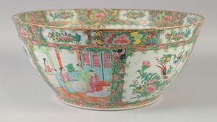 A LARGE CHINESE CANTON FAMILLE ROSE PORCELAIN PUNCH BOWL, 39cm diameter.