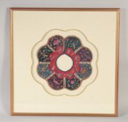 A 19TH CENTURY CHINESE WOMAN'S CLOTHES ACCESSORY / COLLAR, framed and glazed, 46cm square.