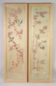 A FINE PAIR OF LATE 19TH CENTURY CHINESE SILK PANELS, with birds and trees, framed and glazed,