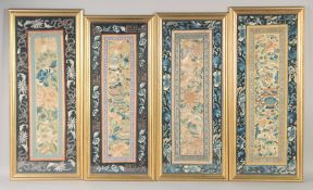 A GROUP OF FOUR 19TH CENTURY CHINESE TEXTILES OF FLOWERS, framed and glazed, largest 23.5cm x