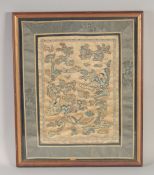 A 19TH CENTURY CHINESE SILK PANEL, depicting a Chinese love story, framed and glazed, 43cm x 34.