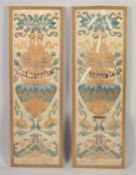 A PAIR OF 19TH CENTURY CHINESE SILK PANELS OF FLOWER VASES, framed and glazed, textile 65cm x 19.