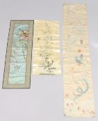A COLLECTION OF THREE EARLY 20TH CENTURY CHINESE TABLE RUNNERS, depicting dragons, birds and