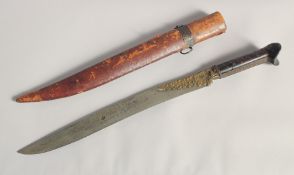 A 19TH CENTURY OTTOMAN BALKANS SHORT YATAGHAN SWORD, with inlaid horn handle and leather overlaid