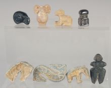 A COLLECTION OF EIGHT ARCHAIC STYLE OBJECTS, (8).