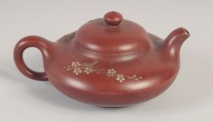 A SMALL CHINESE YIXING TEAPOT, with impressed mark to base, 13cm spout to handle.