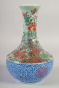 AN UNUSAL JAPANESE CELADON GLAZE PORCELAIN VASE, 27cm high.