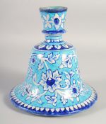 A LARGE 19TH CENTURY INDIAN MUGHAL BLUE AND WHITE GLAZED TERRACOTTA HUQQA BASE, painted with