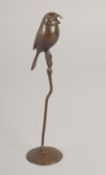 A BRONZE OKIMONO OF A BIRD, 16cm high.