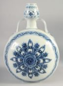 A CHINESE BLUE AND WHITE PORCELAIN MOON FLASK, with twin handles and six-character mark, 30.5cm