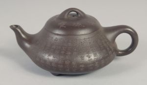 A SMALL CHINESE YIXING TEAPOT, with calligraphy, impressed trade mark to base, 14.5cm spout to