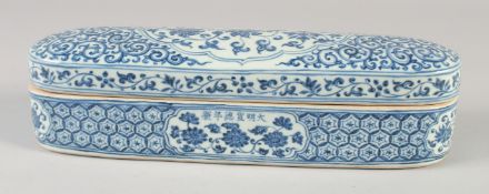 A LARGE CHINESE BLUE AND WHITE PORCELAIN PEN BOX, with six-character mark, 31cm long.
