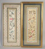 TWO EARLY 20TH CENTURY CHINESE SILK PANELS, framed and glazed, largest textile 65cm x 26cm, (2).