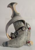 AN EARLY 20TH CENTURY ARAB AMANI HORN HILTED JAMBIYA, with silver mounted and velvet overlaid wooden