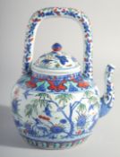 A CHINESE MING STYLE DOUCAI PORCELAIN TEAPOT, painted with cranes and flora, base with six-character