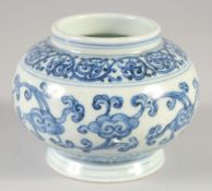A CHINESE BLUE AND WHITE PORCELAIN POT, six-character mark to base, 9cm high.