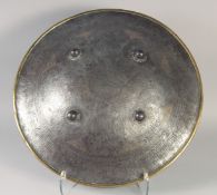 A PERSIAN QAJAR GOLD INLAID STEEL SHIELD, with panels of calligraphy and four raised bosses, further