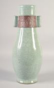 A LARGE CHINESE CELADON CRACKLE GLAZE VASE, with twin handles, 40cm high.