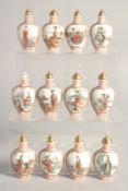 A CASED SET OF FOURTEEN CHINESE PORCELAIN SNUFF BOTTLES & STOPPERS, each decorated in grisaille