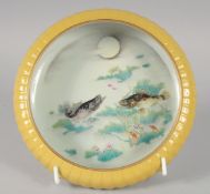 A CHINESE FAMILLE VERTE PORCELAIN BRUSH WASHER, with yellow glaze exterior, the interior decorated