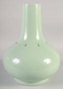 A LARGE CHINESE CELADON PORCELAIN VASE, six-character mark to base, (af), 33cm high.