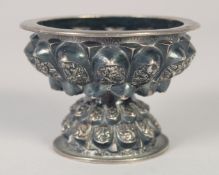 A SMALL 19TH CENTURY MALAY SILVER FOOTED BOWL, 7.5cm diameter.