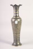 A FINE INDIAN METAL VASE, with engraved decoration, 40.5cm high.