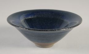 A CHINESE BLUE GLAZE NOGIME TENMOKU POTTERY BOWL, with carved characters two base, 15cm diameter.